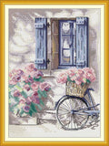 Bicycle loaded with flowers
